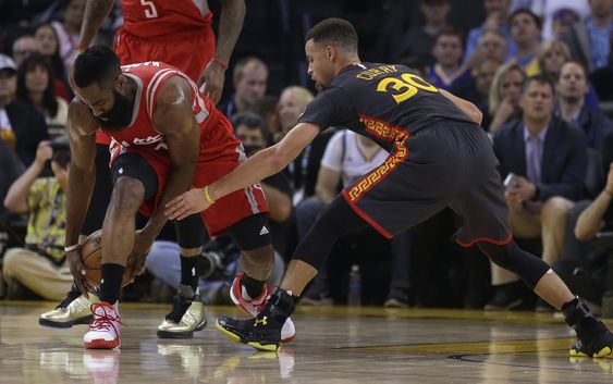 Harden left keeps the ball from Golden State Warriors Stephen Curry during the first half of an NBA basketball game Tuesday Feb. 9 2016 in Oakland Calif