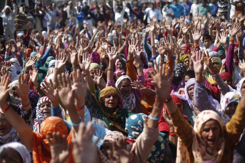 Demonstrators from the Jat community shout slogans as they block the Delhi Haryana national highway during a protest at Sampla village in Haryana India