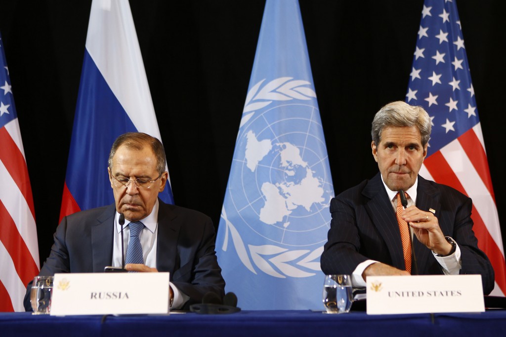 Secretary of State John Kerry and Russian Foreign Minister Sergey Lavrov arrive for a news conference after the International Syria Support Group meeting in Munich Germany Friday