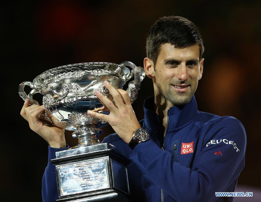 MELBOURNE Jan. 31 2016 - Novak Djokovic of Serbia poses with the trophy after winning the final of men