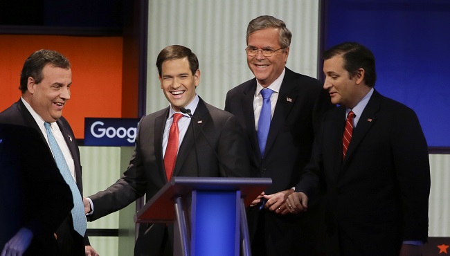 Republican presidential candidates New Jersey Gov. Chris Christie Sen. Marco Rubio R-Fla. former Florida Gov. Jeb Bush and Sen. Ted Cruz R-Texas talk after the Republican presidential primary debate Thursday Jan. 28 2016 in Des Moines Iowa