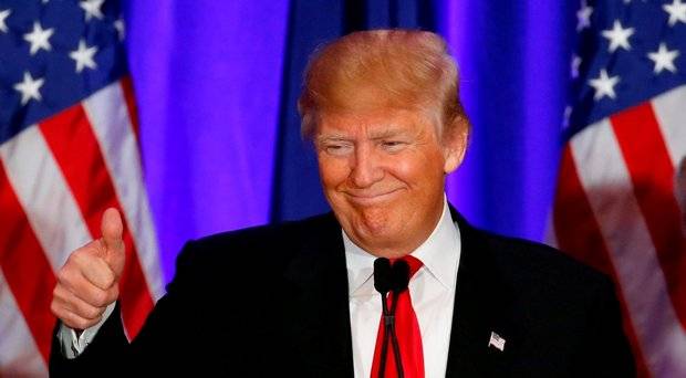 Republican presidential candidate Donald Trump gives a thumbs up during a South Carolina Republican primary night event Saturday Feb. 20 2016 in Spartanburg S.C. Trump is the winner in the South Carolina Republican primary