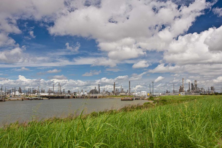 Several production plants rise above the coastal plain at Dow Chemical Co's. petrochemical complex in near Freeport in Brazoria County. A proposed merger with Du Pont would create a chemical colossus that then would spin petrochemical operations into one