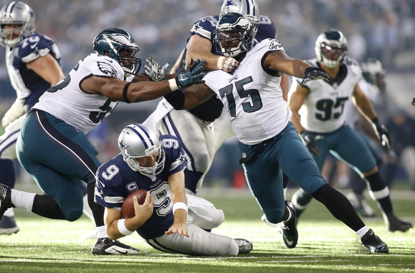 Nov 27 2014 Arlington TX USA Dallas Cowboys quarterback Tony Romo is sacked by Philadelphia Eagles defensive end Vinny Curry and linebacker Brandon Graham in the second quarter at AT&T Stadium. Mandatory Credit Tim Heitman-USA TODAY Sp