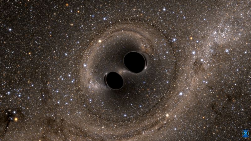 A still image of the collision of two black holes a tremendously powerful event detected for the first time ever by the Laser Interferometer Gravitational Wave Observatory. Researchers say they identified gravitational waves coming from two distant black