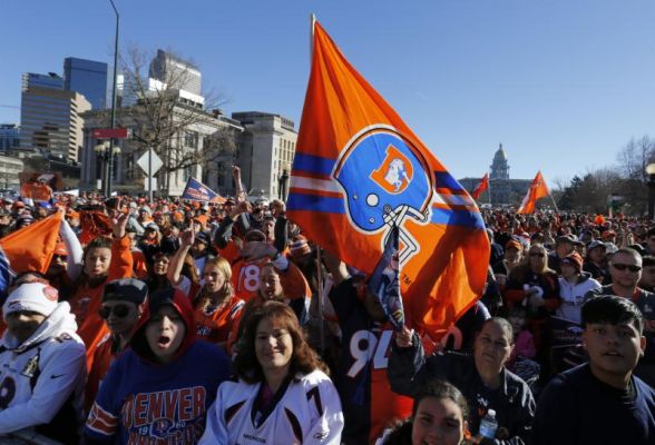 Broncos fans cheer after arriving early to await