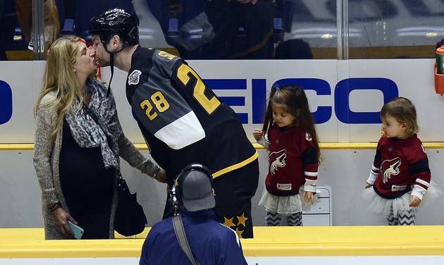 Pacific Division forward John Scott kisses his wife after being named most valuable player in the NHL hockey All Star championship game Sunday Jan. 31 2016 in Nashville Tenn. The Pacific Division beat the Atlantic Division 1-0