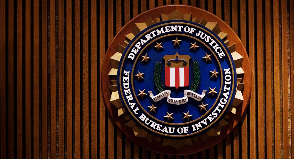 A crest of the Federal Bureau of Investigation is seen 03 August 2007 inside the J. Edgar Hoover FBI Building in Washington DC