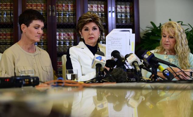 Attorney Gloria Allred is flanked by Cosby accusers Beth Ferrier and Rebecca Lynn