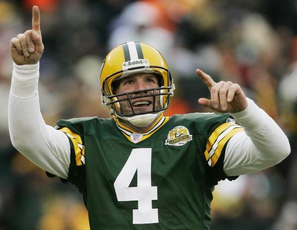 Green Bay Packers quarterback Brett Favre reacts to a 46-yard touchdown pass to tight end Donald Lee during the second half of an NFL football game against the Oakland Raiders in Green Bay Wis. Favre will be inducted int