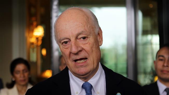 The UN special envoy for Syria Staffan de Mistura speaks to the press as he leaves his hotel in the Syrian capital Damascus