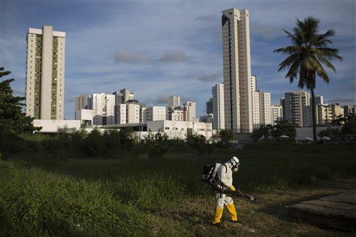 A municipal health worker sprays insecticide in an open area of a sports facility to combat the Aedes aegypti mosquito that transmits the Zika virus in Recife Pernambuco state Brazil Thursday Feb. 4 2016. With no hope for a vaccine to prevent Zika