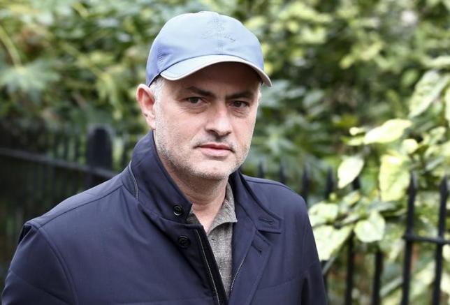 Former Chelsea soccer club manager Jose Mourinho walks near to his home in London Britain