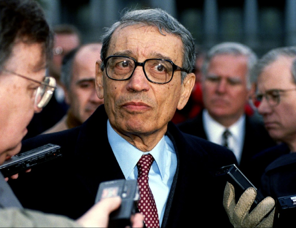 U.N. Secretary General Boutros Boutros Ghali is surrounded by reporters as he leaves the White House after meeting with then President Bill Clinton in this Feb 23 1993 file