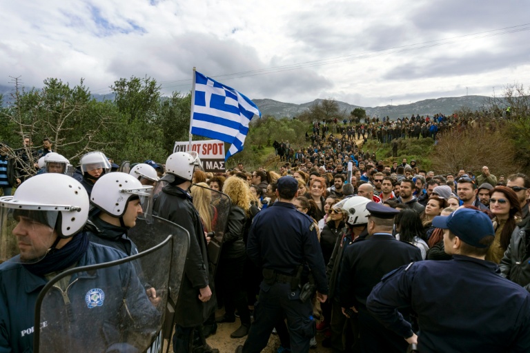 Eurokinissi  AFP  People protest against the so-called'hotspot being built for refugees and migrants on the Greek island of Kos