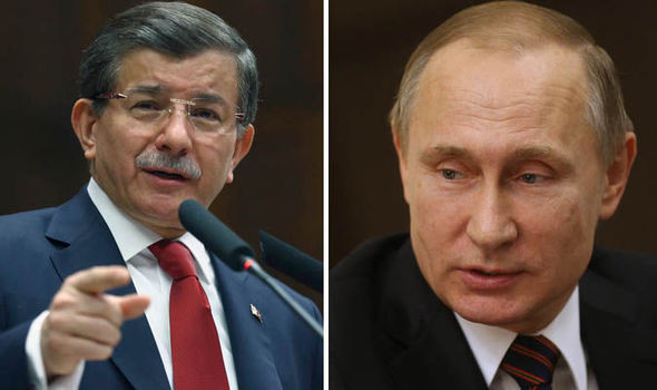 Turkish prime minister Ahmet Davutoglu left and Vladimir Putin right