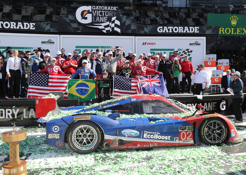 Rolex 24 Hr at Daytona 2016 TV streaming schedule. Here 2015 winners celebrating in Victory Lane