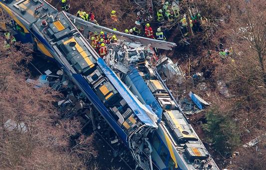 Aerial view of rescue forces working at the site of a train accident near Bad Aibling Germany Tuesday Feb. 9 2016. Several people were killed when two trains collided head-on