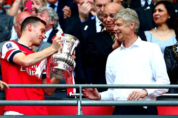 Thomas Vermaelen and Arsene Wenger