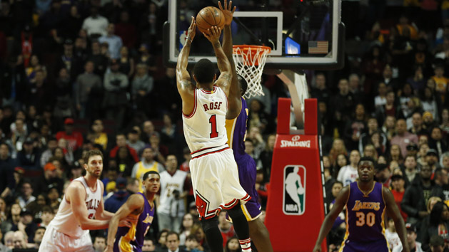 Feb 21 2016 Chicago IL USA Chicago Bulls guard Derrick Rose shoots and scores against Los Angeles Lakers forward Brandon Bass during the second half at United Center. Mandatory Credit Kamil Krzaczynski-USA TODAY Sports