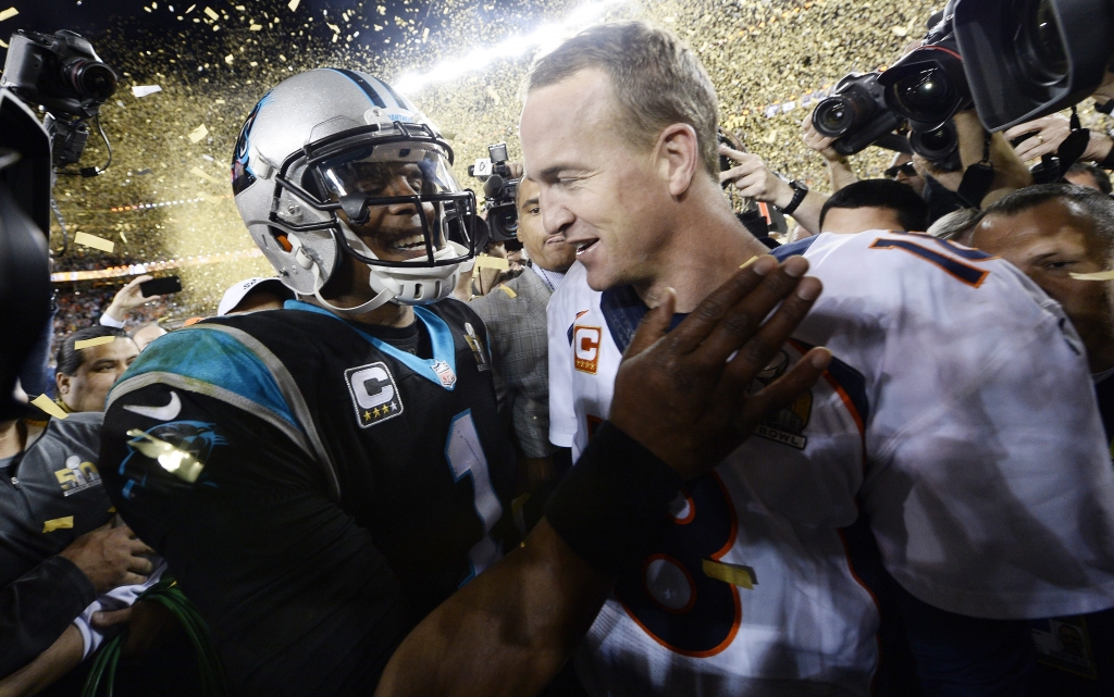 Denver Broncos quarterback Peyton Manning and Carolina Panthers quarterback Cam Newton together after the end of the NFL's Super Bowl 50 between the AFC Champion Denver Broncos and the NFC Champion Carolina Panthers at Levi's Stadium in Santa Cl