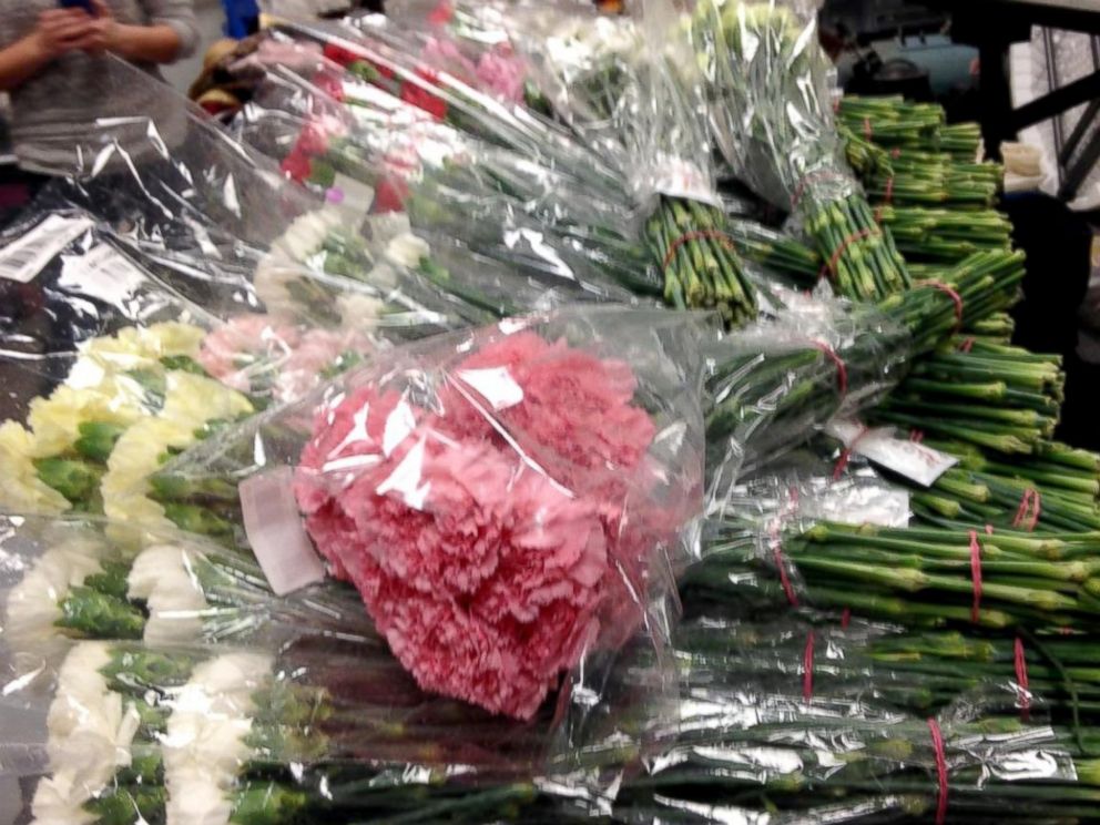 Hayden Godfrey The high school senior bought carnations in more than six colors from an online wholesaler to hand out to every girl in school