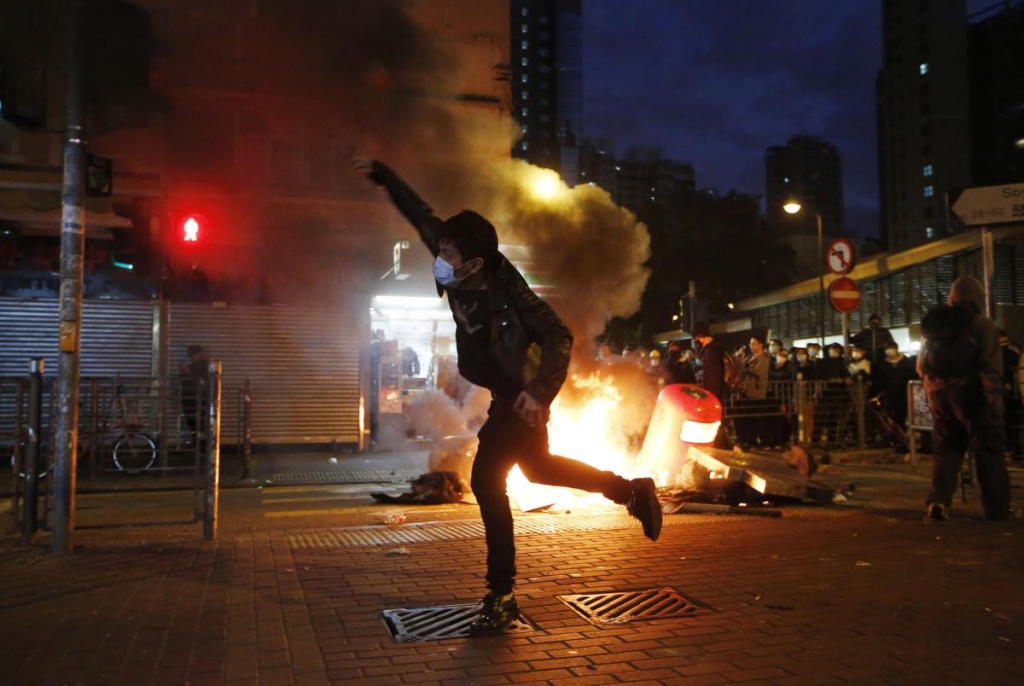 Hong Kong activists, police clash over holiday food stalls