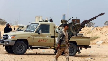 IS, armed fighters clash near Libyan capital, leaving four dead, says local official