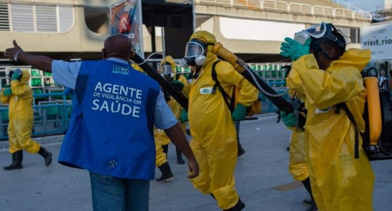 Municipal agents spray anti Zika mosquitos chimical product at the sambadrome in Rio de Janeiro on Jan. 26 2016