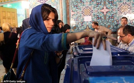 Iranian woman voting. AFP