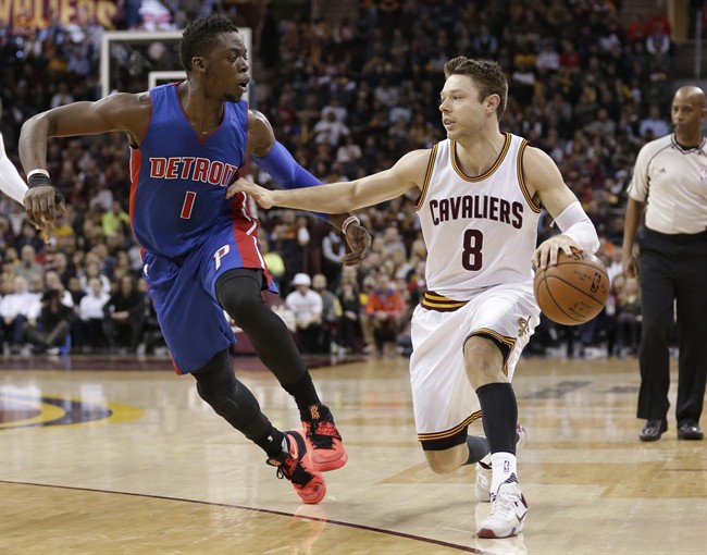 Cleveland Cavaliers Matthew Dellavedova, from Australia drives past Detroit Pistons Reggie Jackson, from Italy in the first half of an NBA basketball game Monday Feb. 22 2016 in Cleveland