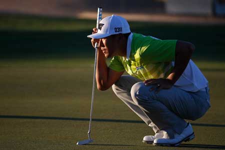 James Hahn lines up a putt on the ninth hole during the second round of the Waste Management Phoenix Open at TPC Scottsdale on Saturday in Scottsdale Arizona. AFP