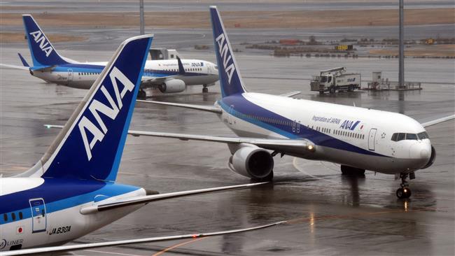 Japanese All Nippon Airways passenger jets at Haneda airport in Tokyo