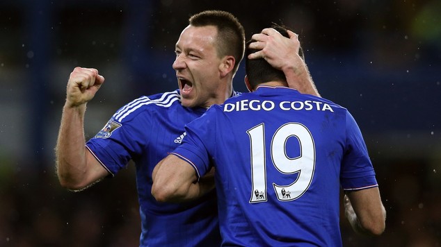 John Terry left celebrates Chelsea's equaliser against Manchester United