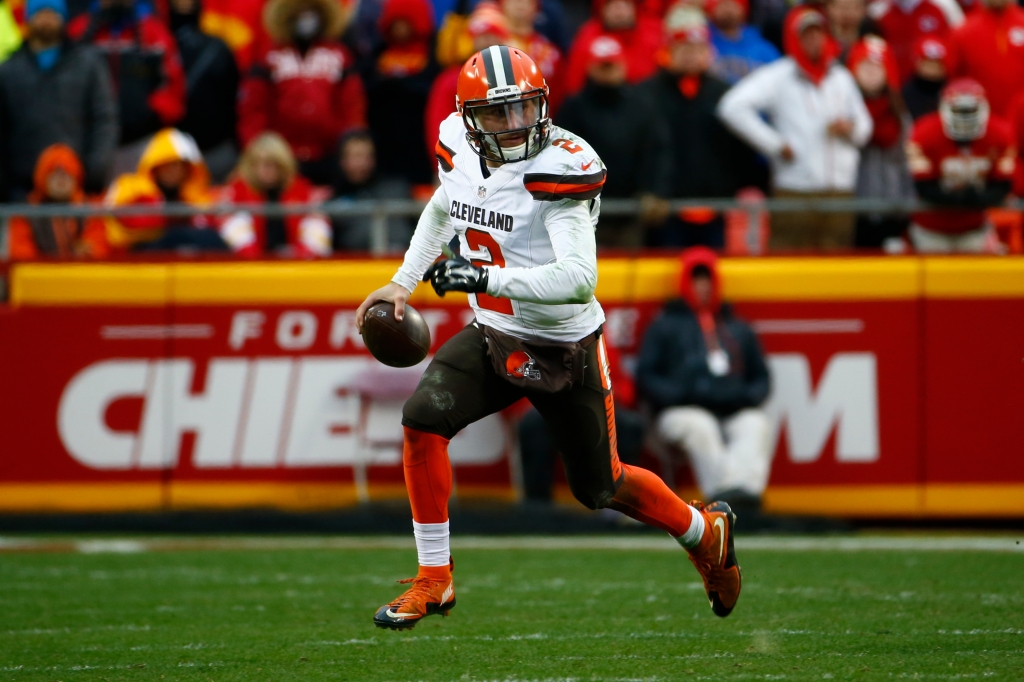 Johnny Manziel of the Cleveland Browns rolls out of the pocket at Arrowhead Stadium during the fourth quarter of the game against the Kansas City Chiefs