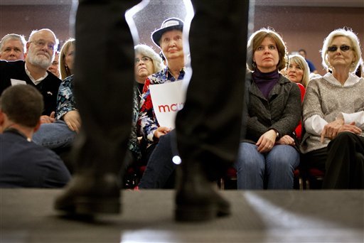 Beverly Gail of North Myrtle Beach S.C. center watches as Republican presidential candidate Sen. Marco Rubio R-Fla. speaks during a town hall meeting in Myrtle Beach S.C. Thursday Feb. 11 2016