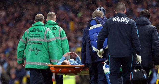 Kevin De Bruyne leaves the pitch injured on a stretcher during Man City's midweek win over Everton