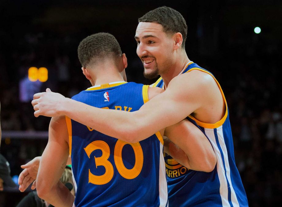 Golden State Warriors guard Klay Thompson hugs Golden State Warriors guard Stephen Curry after winning the three point competition at the NBA all-star weekend in Toronto on Saturday Feb. 13 2016. MANDATO