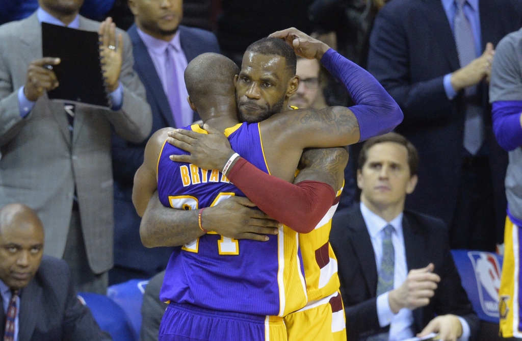 Kobe Bryant and Lebron James Embrace during Pregame on Wednesday Night. Mandatory Credit David Richard-USA TODAY Sports