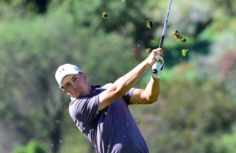 AFP  Frederic J. Brown World No. 1 golfer Jordan Spieth of the US follows through on a shot to the green on the 18th hole on day two of the Northern Trust Open at the Riviera Country Club in Pacific Palisades California