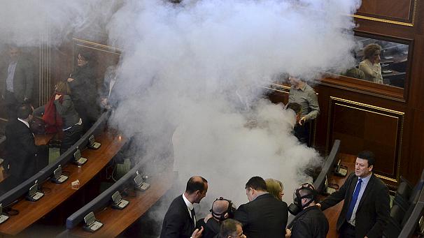 Kosovo opposition lawmakers block parliament with tear gas