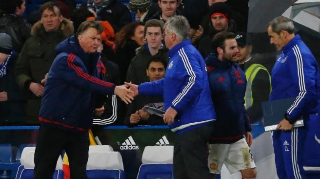 Manchester United manager Louis van Gaal shakes hands with Chelsea interim manager Guus Hiddink after an English Premier League football match at Stamford Bridge in London