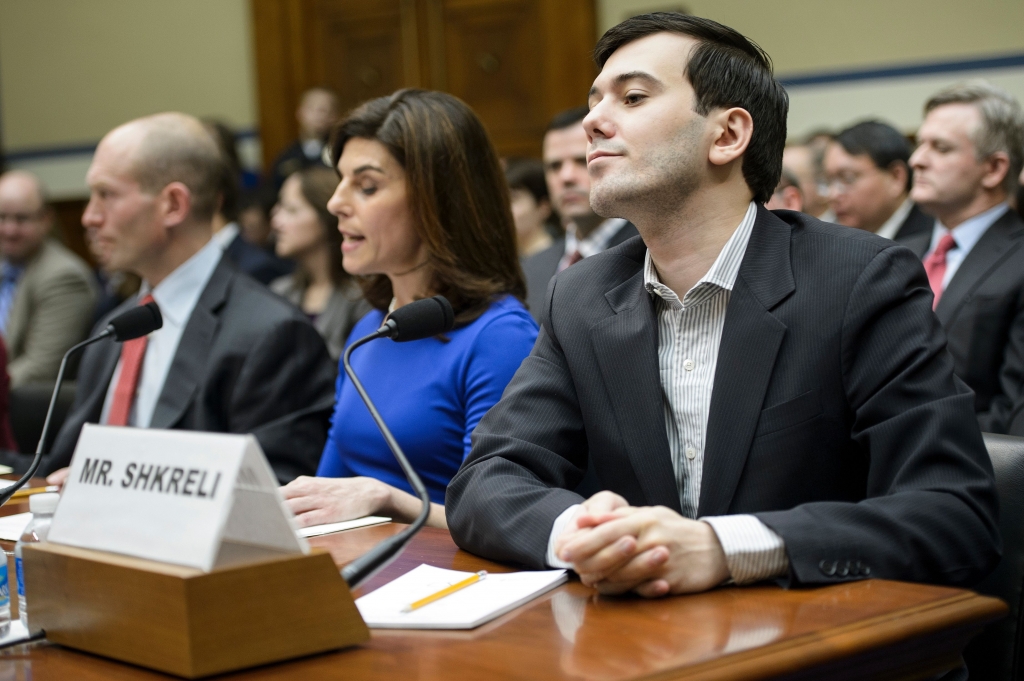 Martin Shkreli listens during a hearing of the House Oversight and Government Reform Committee on Capitol Hill