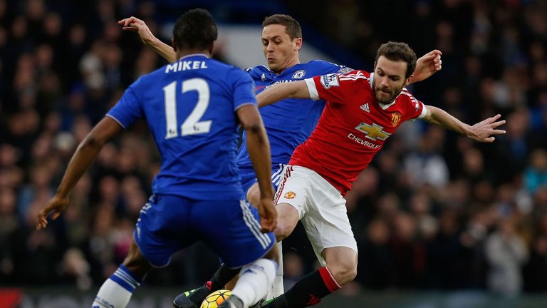 Mata vies with Nemanja Matic at Stamford Bridge