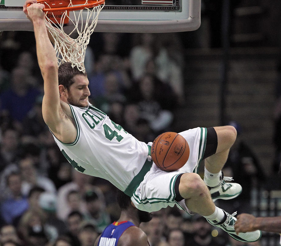 Matt Stone   Tyler Zeller dunks during the Celtics game against the Pistons at the Garden