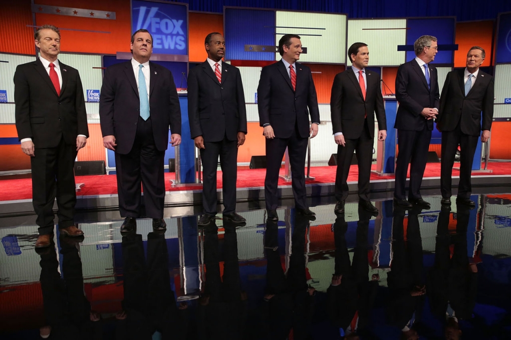 From left Republican presidential candidates Sen. Rand Paul, New Jersey Gov Chris Christie Ben Carson Sen. Ted Cruz, Sen. Marco Rubio, Jeb Bush and Ohio Gov. John Kasich pose for