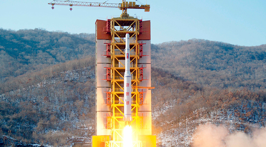 A North Korean long-range rocket is launched into the air at the Sohae rocket launch site North Korea in this