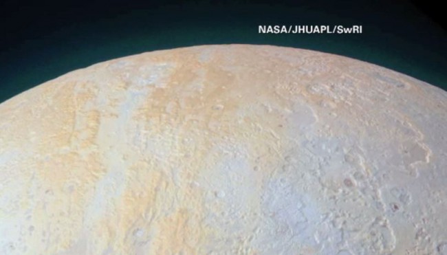 New NASA photo shows the canyons and pits of Pluto's northern pole