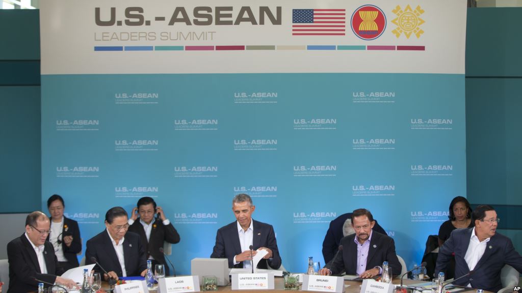 President Barack Obama center opens up his notebook before delivering remarks at the plenary session meeting of ASEAN the 10-nation Association of Southeast Asian Nations at the Annenberg Retreat at Sunnylands in Rancho Mirage Calif. for Feb. 15 20