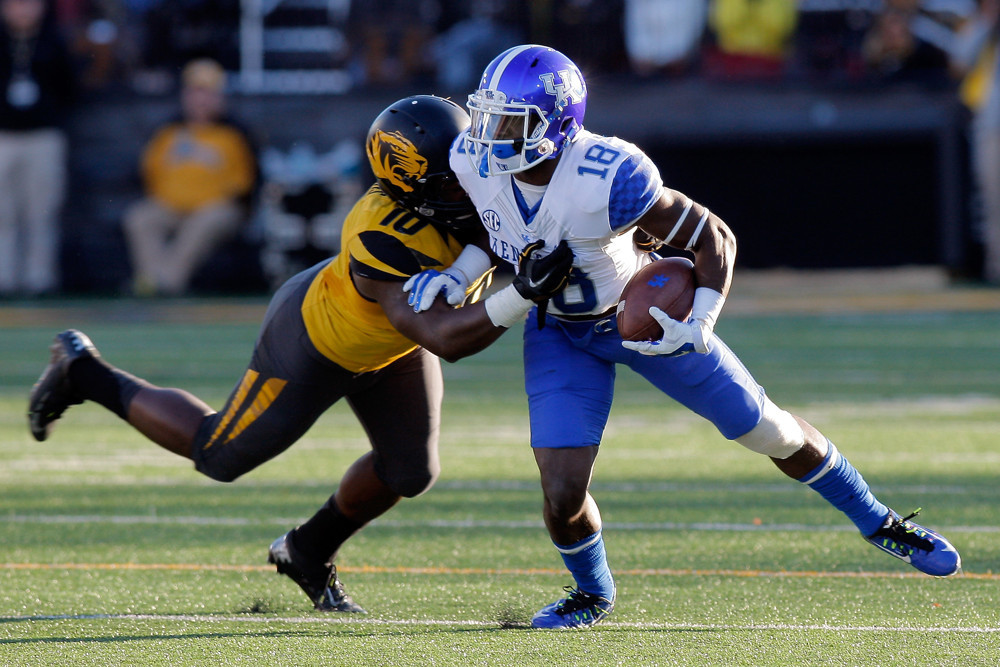 1 NOV. 2014 Missouri Tigers linebacker Kentrell Brothers tackles Kentucky Wildcats running back Stanley Williams during the second half of a NCAA college football game on Faurot Field at Memorial Stadium in Columbia Missouri. Missouri won 20-10